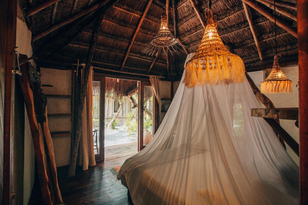 Ikal Tulum Hotel Ngoại thất bức ảnh Interior of a bungalow at the resort