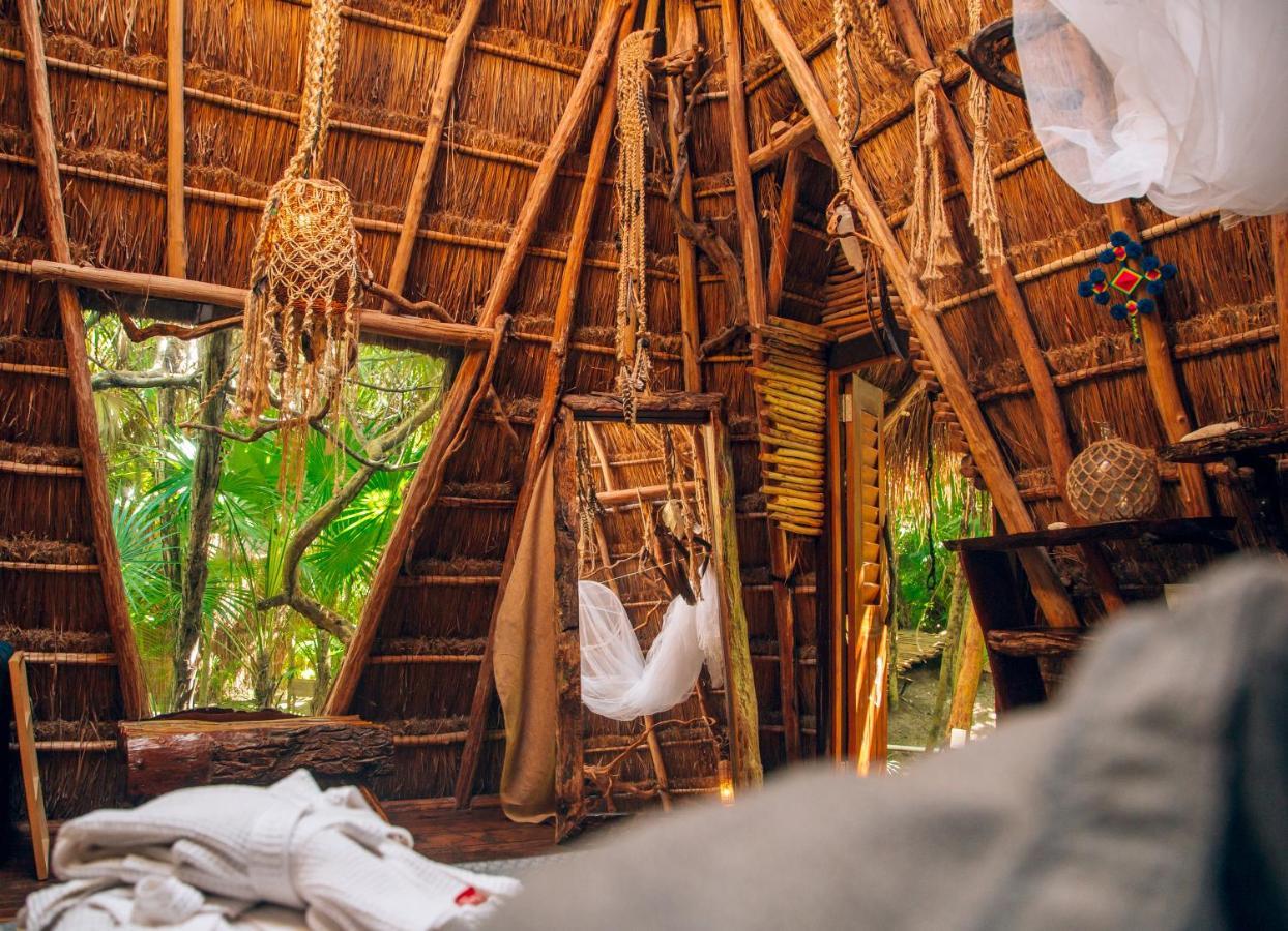 Ikal Tulum Hotel Ngoại thất bức ảnh Interior of a hut at the resort