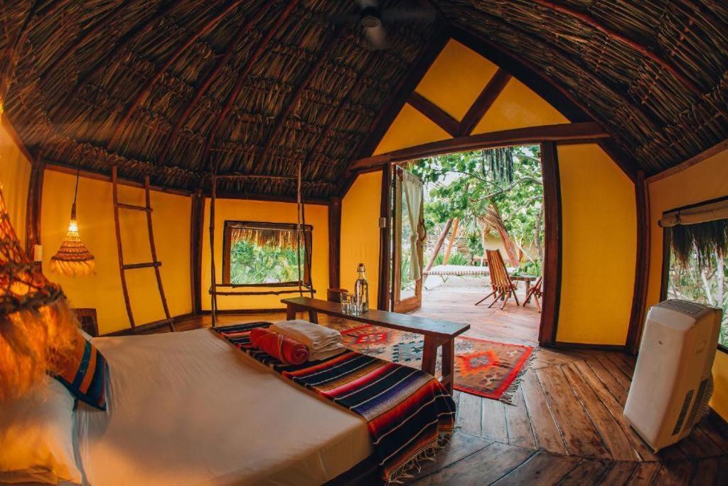 Ikal Tulum Hotel Ngoại thất bức ảnh Interior of a bungalow at Xel-Ha